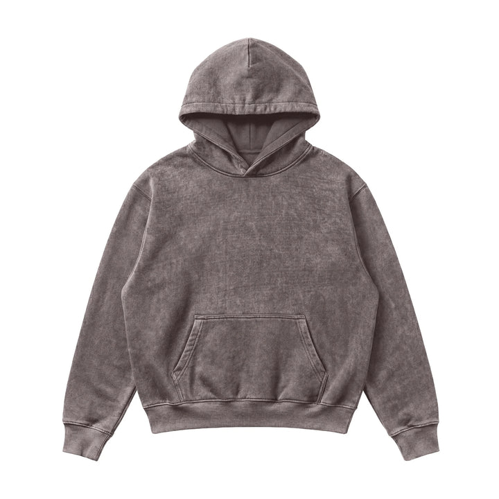 The Mineral Wash Heavy Fleece Hoodie is a heavyweight, relaxed-fit sweatshirt in stonewashed gray with long sleeves and a front pocket, shown laid flat on a white background.